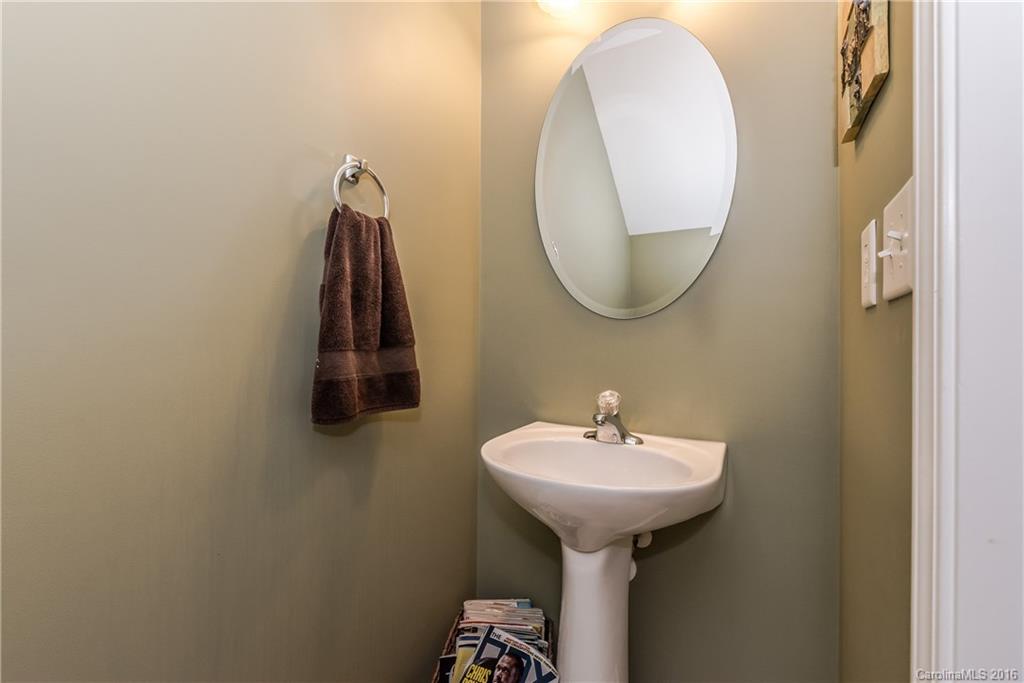 816 Gentlewinds Court, Unit 816 Fort Mill, SC 29708 - Photo 13 of 24 a bathroom with a sink and a mirror