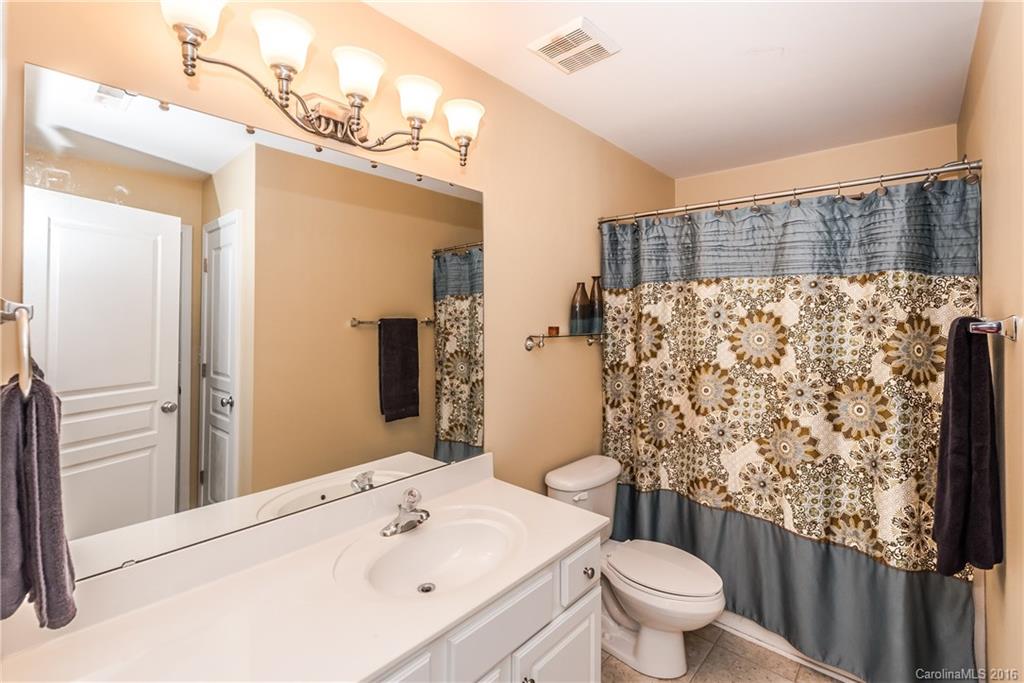 816 Gentlewinds Court, Unit 816 Fort Mill, SC 29708 - Photo 18 of 24 a bathroom with a sink toilet and shower