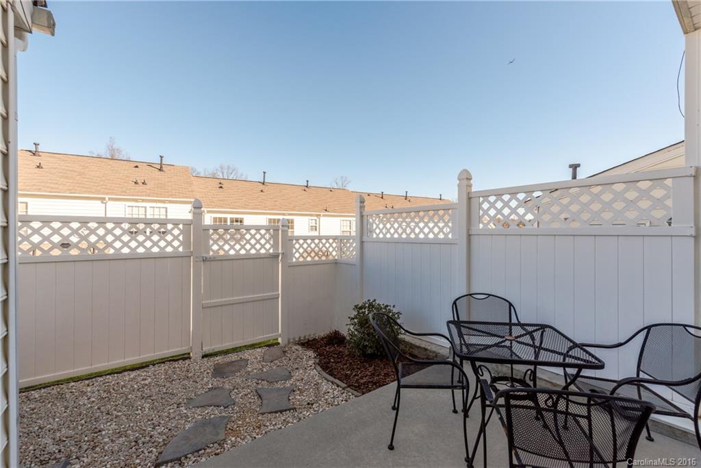 816 Gentlewinds Court, Unit 816 Fort Mill, SC 29708 - Photo 22 of 24 a view of a balcony with chairs
