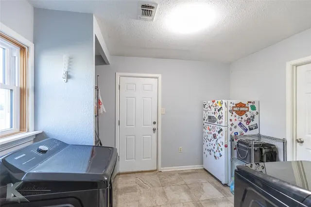 a view of a livingroom with furniture