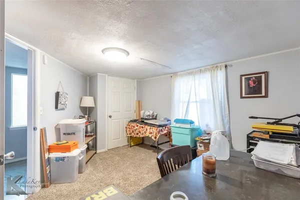 a room with furniture and a chair