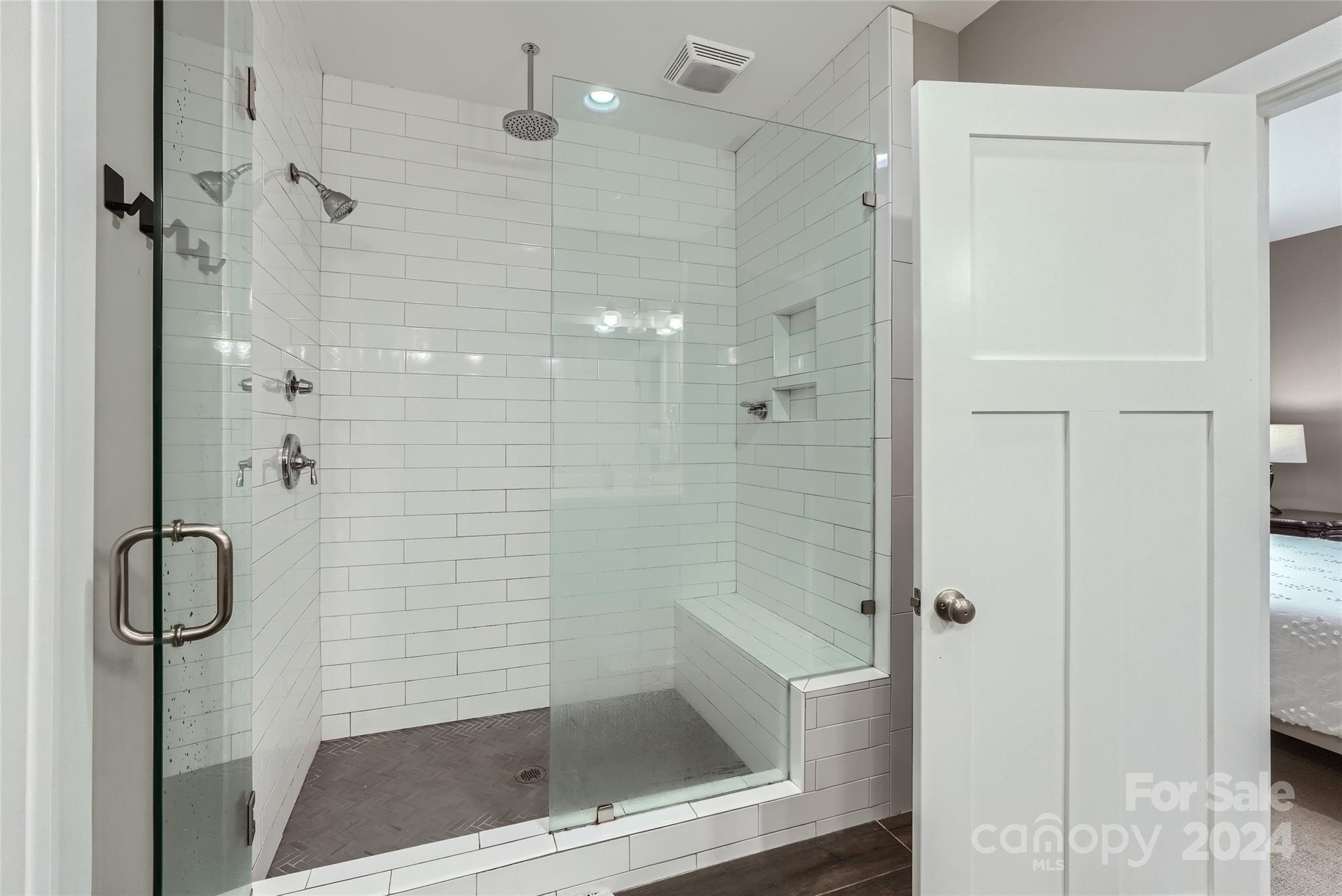 5220 Valley Stream Road Charlotte, NC 28209 - Photo 16 of 24 a bathroom with a shower
