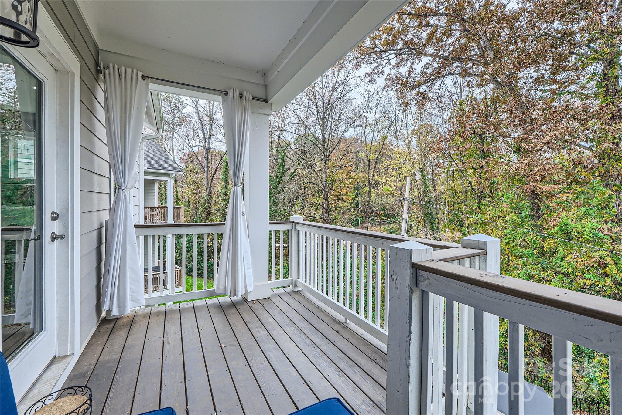 5220 Valley Stream Road Charlotte, NC 28209 - Photo 17 of 24 a view of backyard with deck and wooden floor