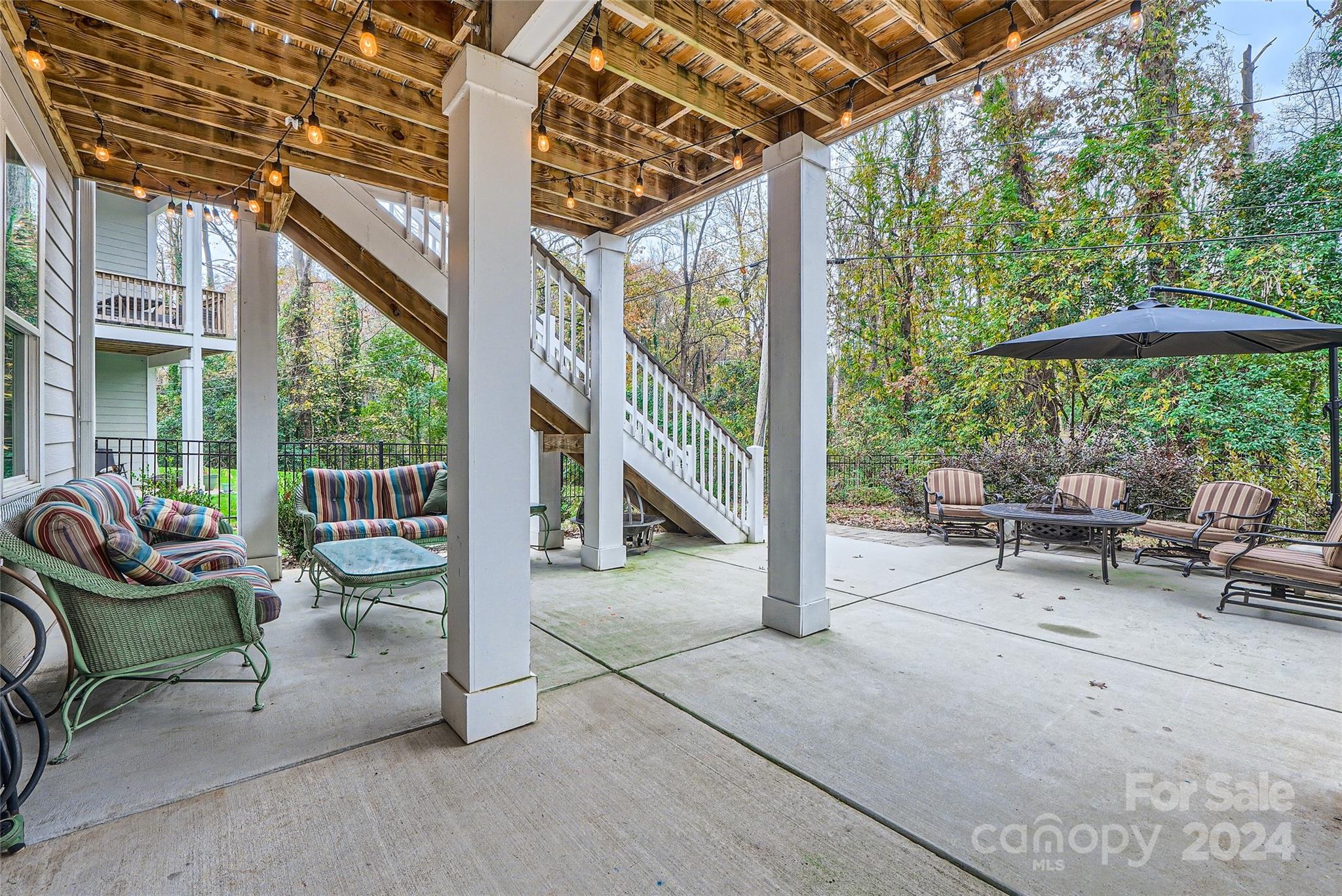 5220 Valley Stream Road Charlotte, NC 28209 - Photo 23 of 24 a view of living room with patio and furniture