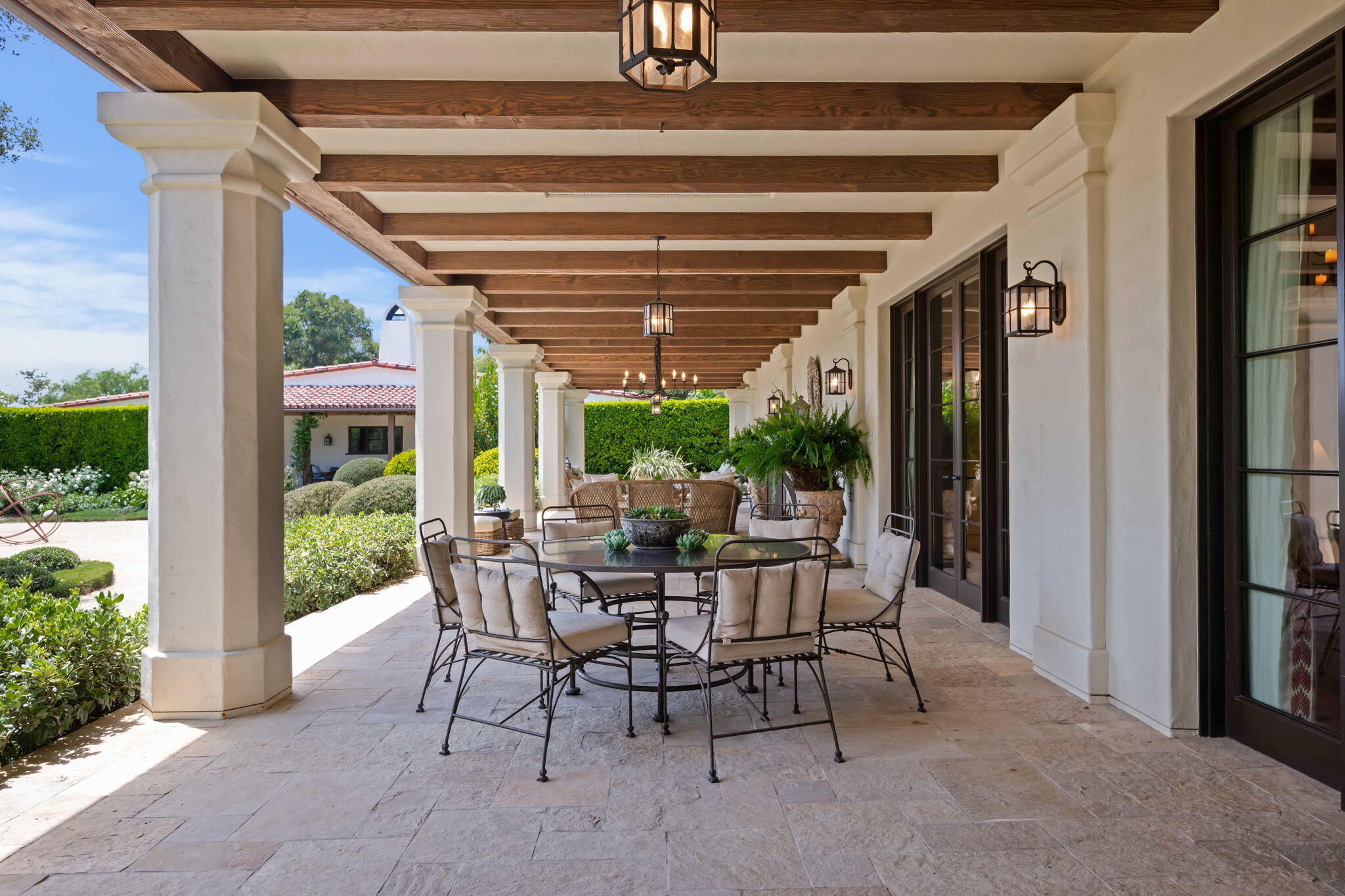 0 Boundary Drive Montecito, CA 93108 - Photo 22 of 26 a view of an outdoor dining space with a table and chairs