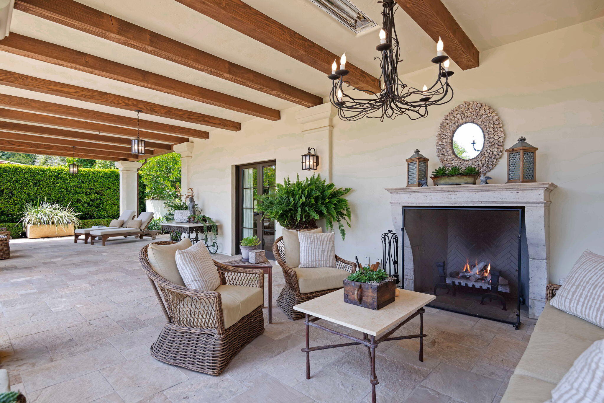 0 Boundary Drive Montecito, CA 93108 - Photo 23 of 26 a living room with furniture a chandelier and a fireplace
