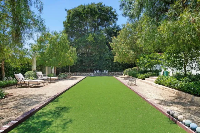 a view of a street with a park