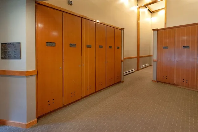 a view of a hallway with closet area