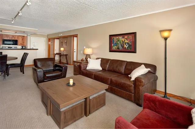 a living room with furniture and a couch