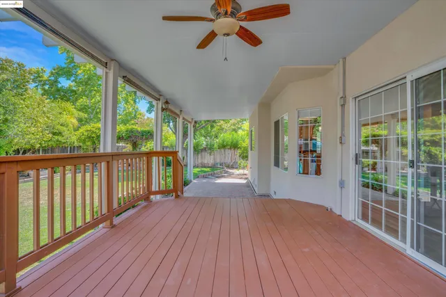 a view of porch with a floor to ceiling window