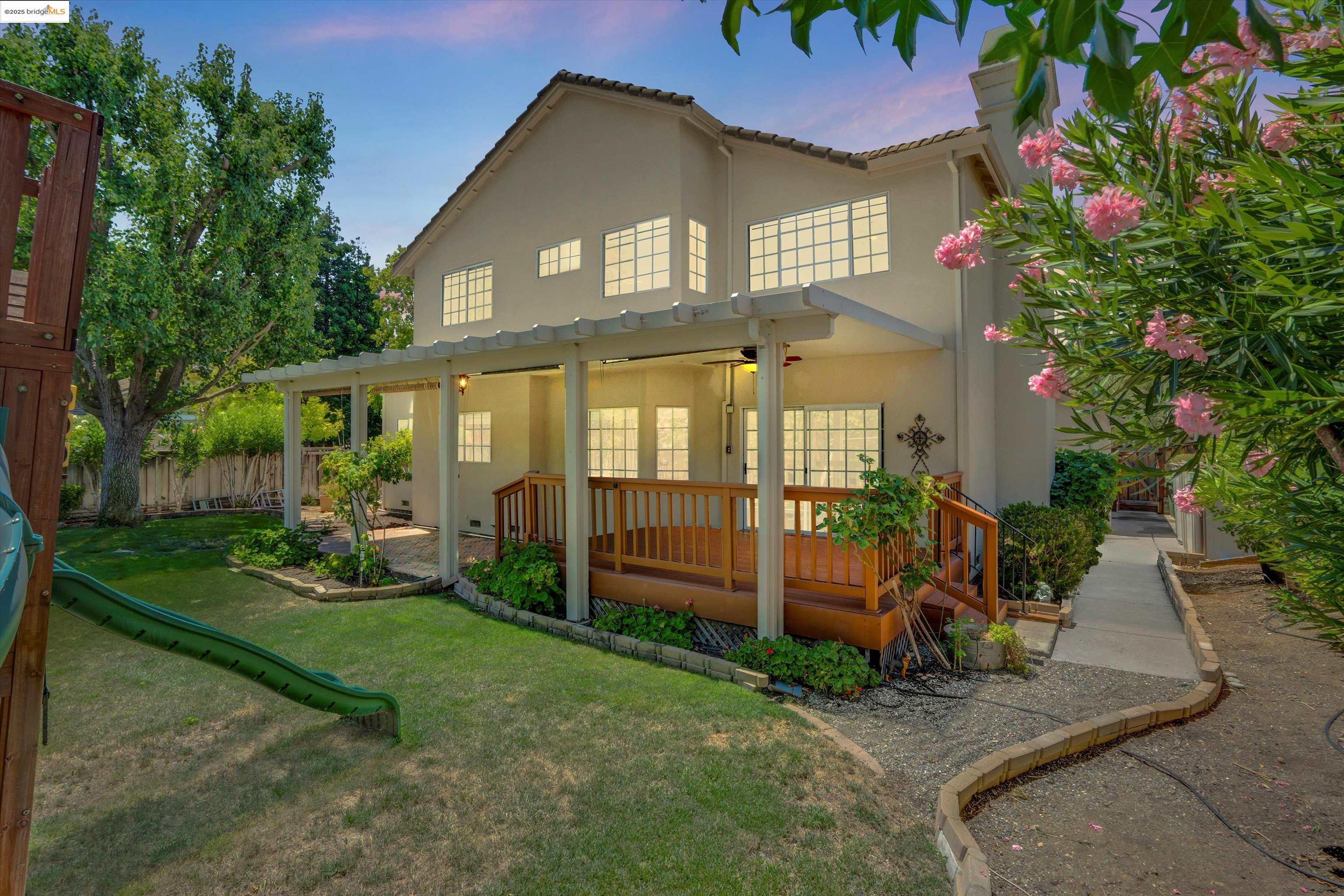 805 Devonshire Loop Brentwood, CA 94513 - Photo 39 of 51 a front view of a house with garden