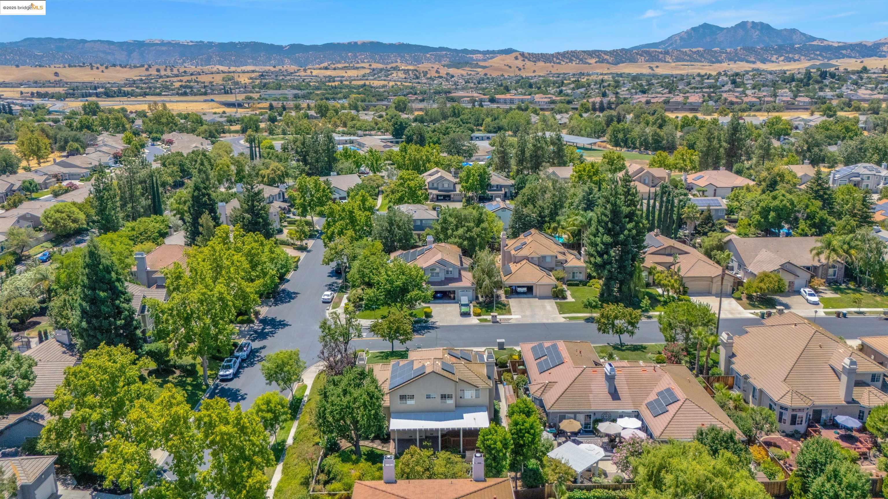 805 Devonshire Loop Brentwood, CA 94513 - Photo 43 of 51 an aerial view of a city with lots of residential buildings