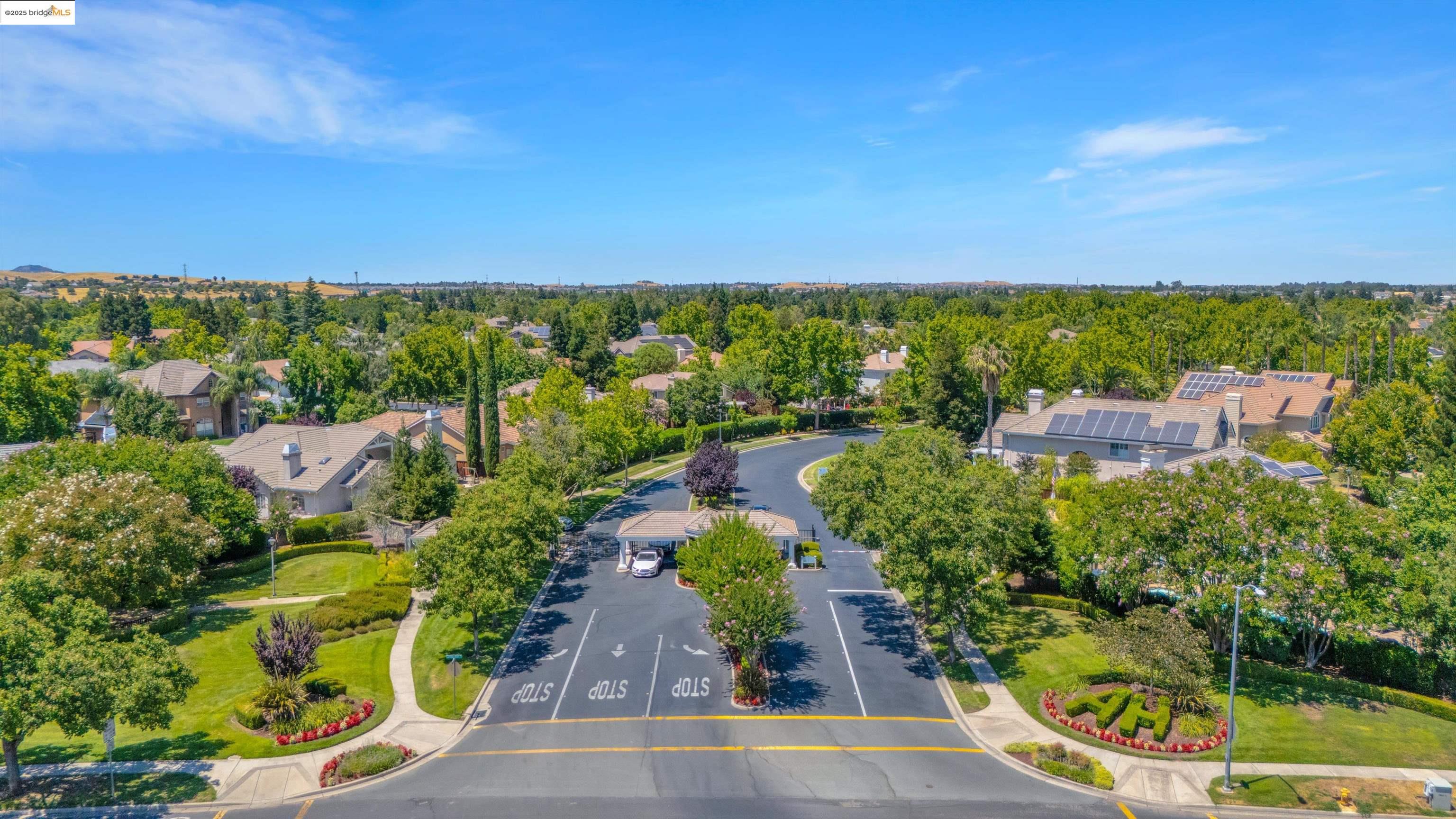 805 Devonshire Loop Brentwood, CA 94513 - Photo 48 of 51 an aerial view of a city with lots of residential buildings ocean and mountain view in back