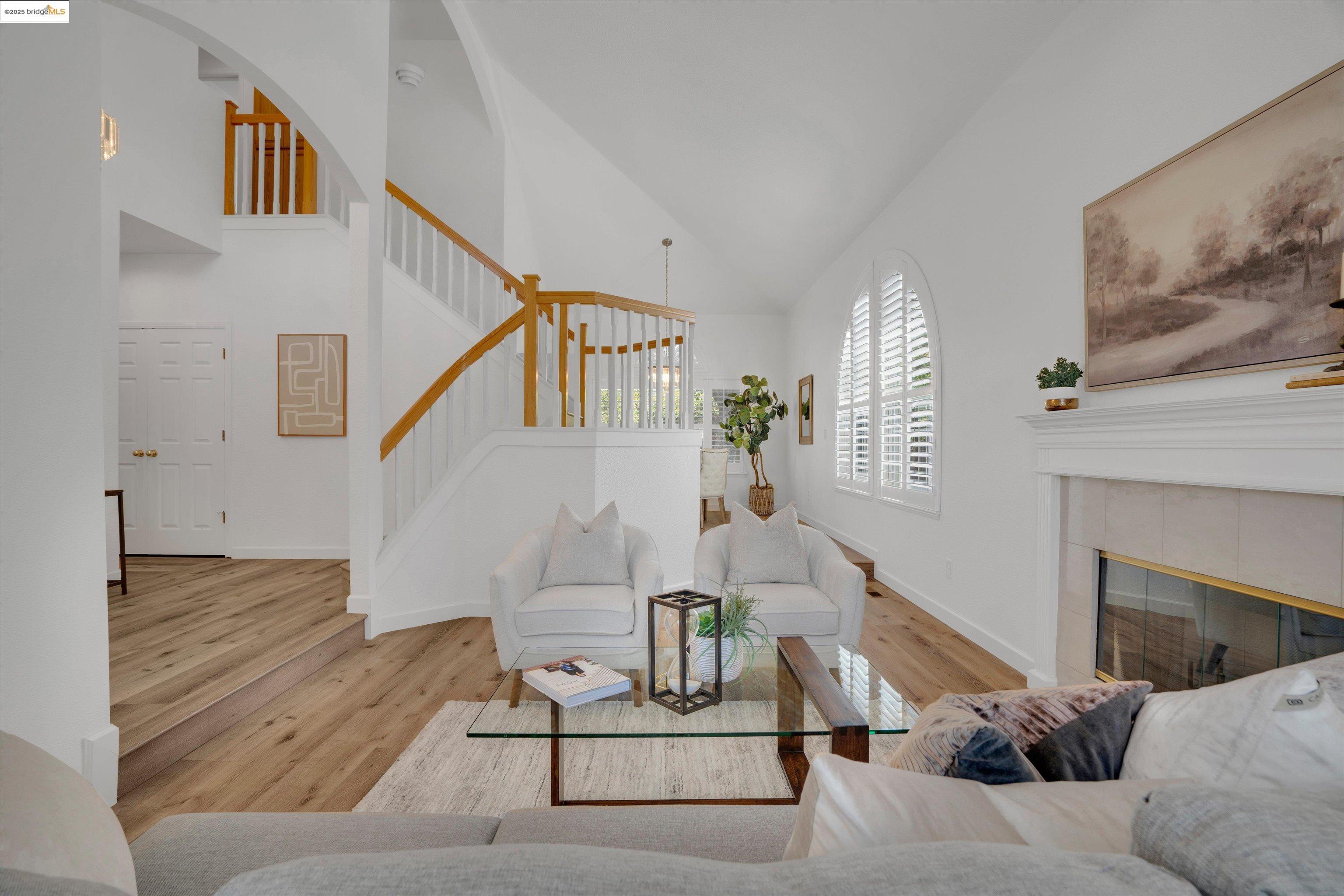 805 Devonshire Loop Brentwood, CA 94513 - Photo 6 of 51 a living room with furniture and a fireplace