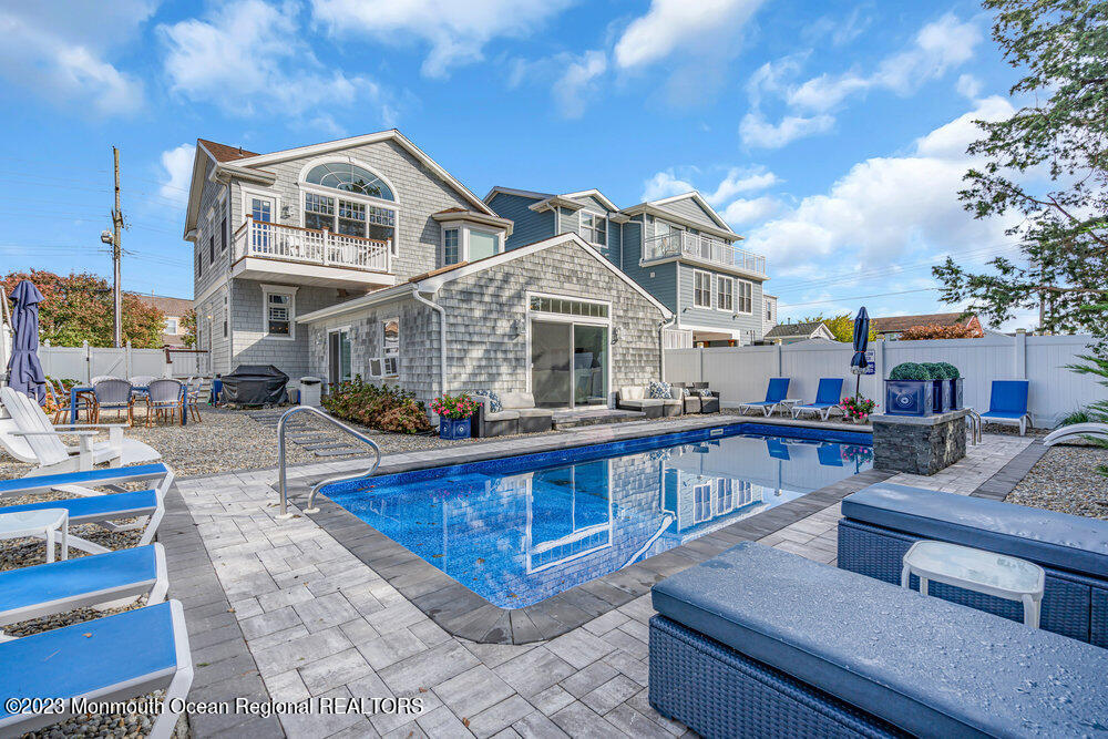 304 Atlantic Avenue Point Pleasant Beach, NJ 08742 - Photo 16 of 20 a view of multiple houses with a yard
