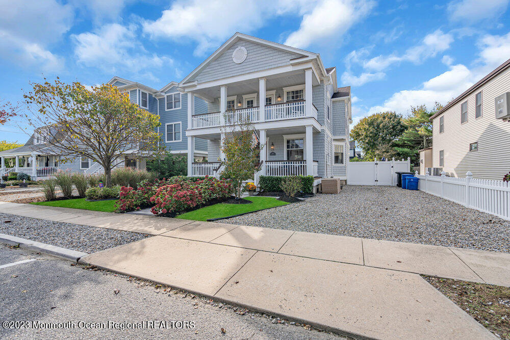 304 Atlantic Avenue Point Pleasant Beach, NJ 08742 - Photo 18 of 20 a front view of a house with a garden