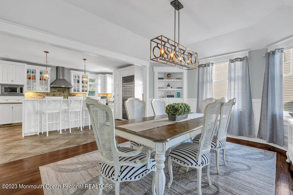 304 Atlantic Avenue Point Pleasant Beach, NJ 08742 - Photo 4 of 20 a view of a dining room with furniture window and wooden floor