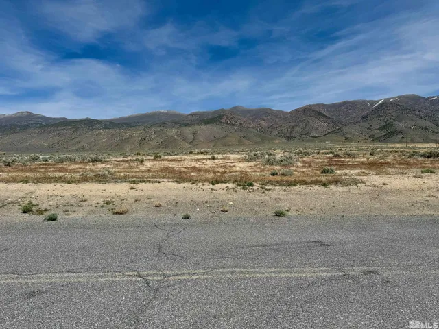 a view of ocean and mountain