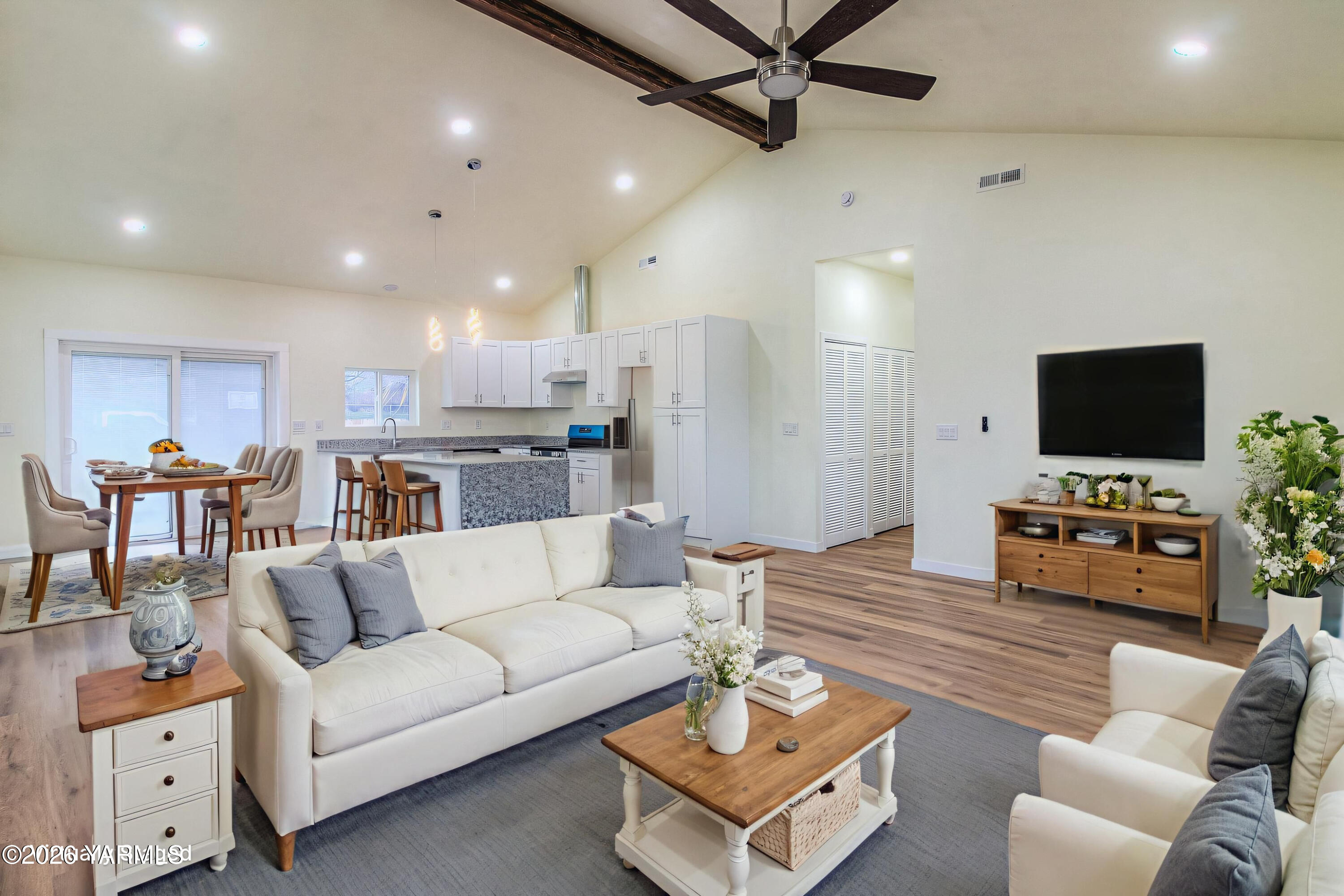 3503 Powerhouse Road Yakima, WA 98902 - Photo 5 of 27 a living room with furniture and a flat screen tv