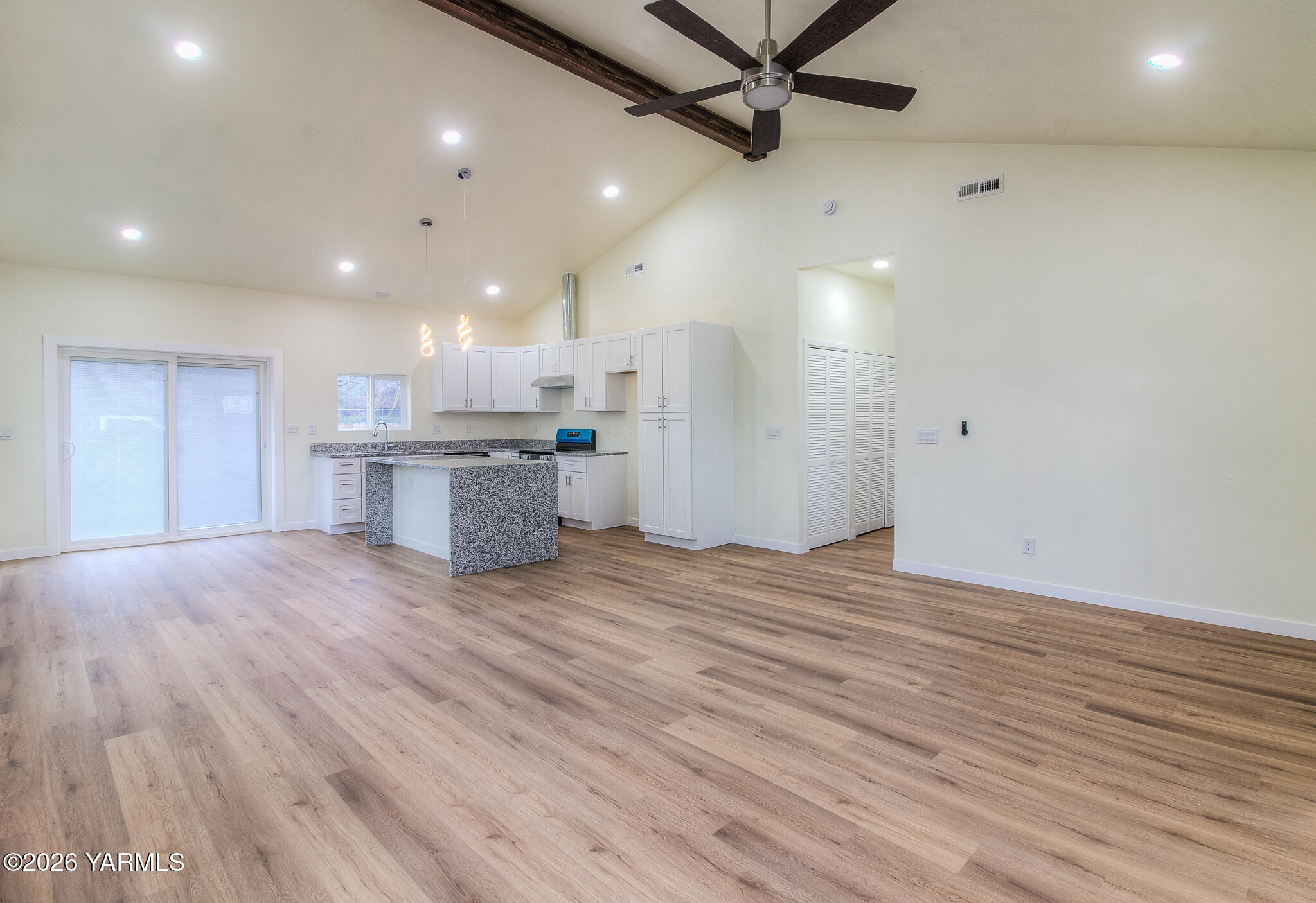 3503 Powerhouse Road Yakima, WA 98902 - Photo 6 of 27 a view of a kitchen with a sink and a refrigerator