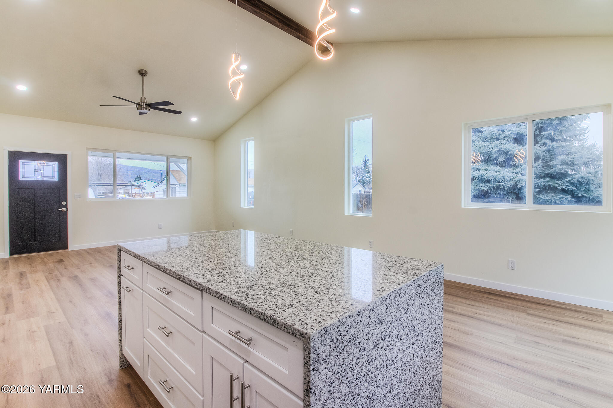 3503 Powerhouse Road Yakima, WA 98902 - Photo 10 of 27 a kitchen with granite countertop a counter space a sink and chandelier