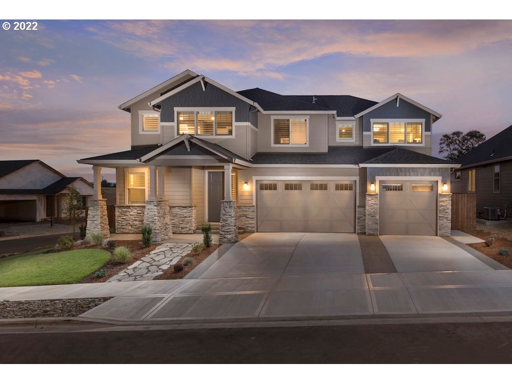 1291 South 44th Avenue Ridgefield, WA 98642 - Photo 1 of 10 a front view of a house with a yard
