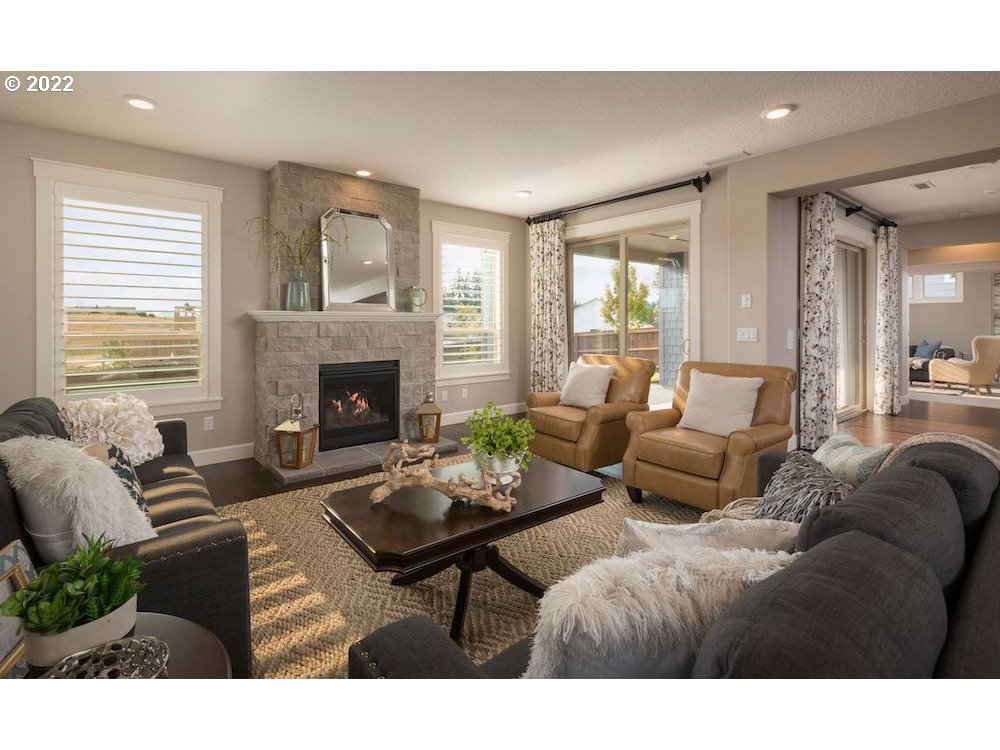 1291 South 44th Avenue Ridgefield, WA 98642 - Photo 10 of 10 a living room with furniture fireplace and window