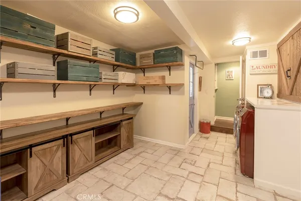 a kitchen with stainless steel appliances cabinets and a counter top