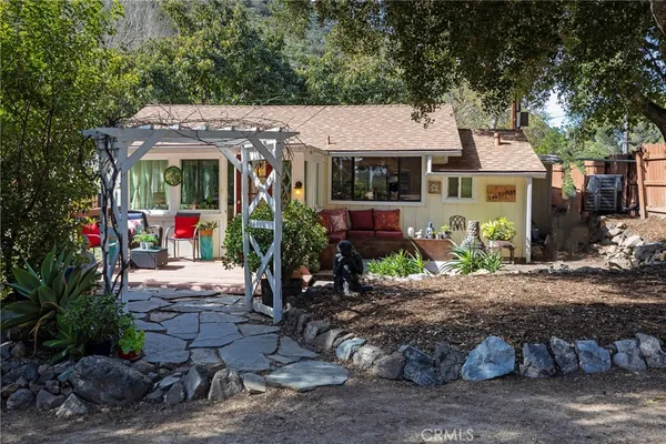 a view of an house with patio