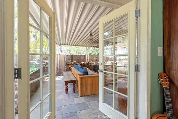 a room with furniture and a large window