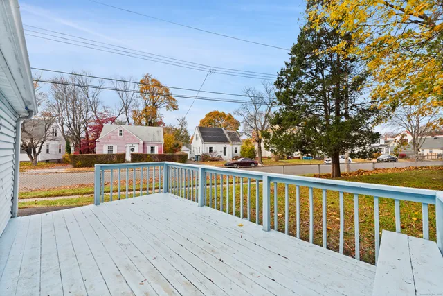 a view of a balcony with staircase