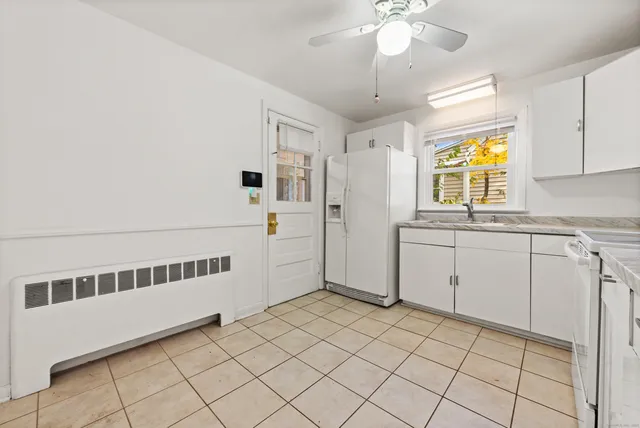 a view of kitchen with windows