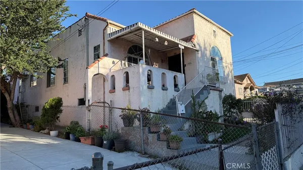 a front view of a house with balcony