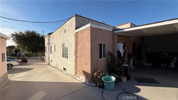 a view of a path along with retail shop and buildings