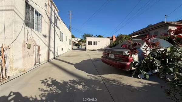 a view of a house with a street