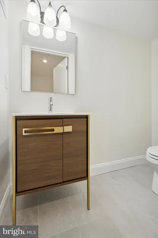a living room with furniture potted plant and a window