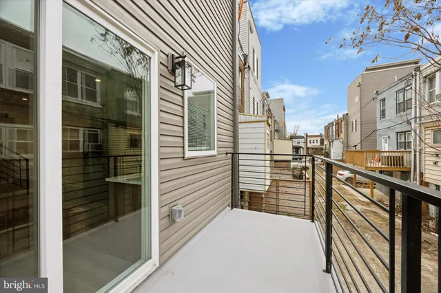 a view of a balcony with city view