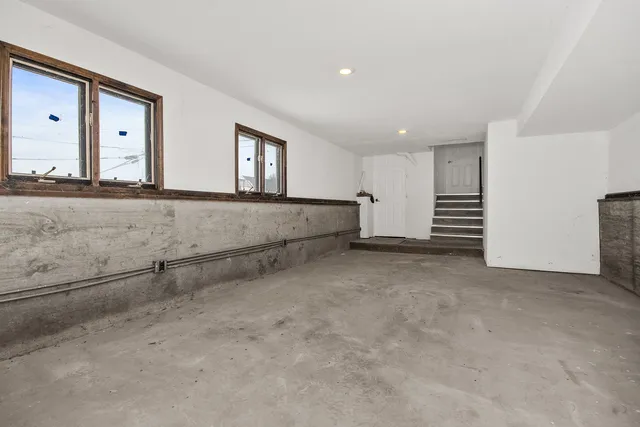 an empty room with a workbench