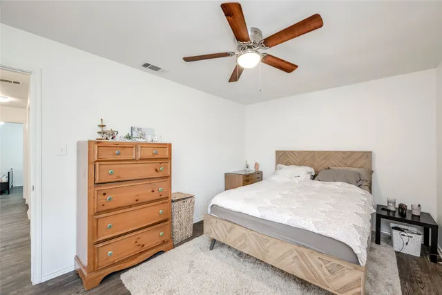 a bedroom with a bed and furniture