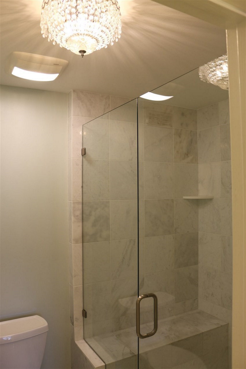 520 Springfork Drive, Unit 520 Cary, NC 27513 - Photo 21 of 25 Marble throughout Master Bedroom Shower with complete Body Water Massage Shower Master Bedroom Shower