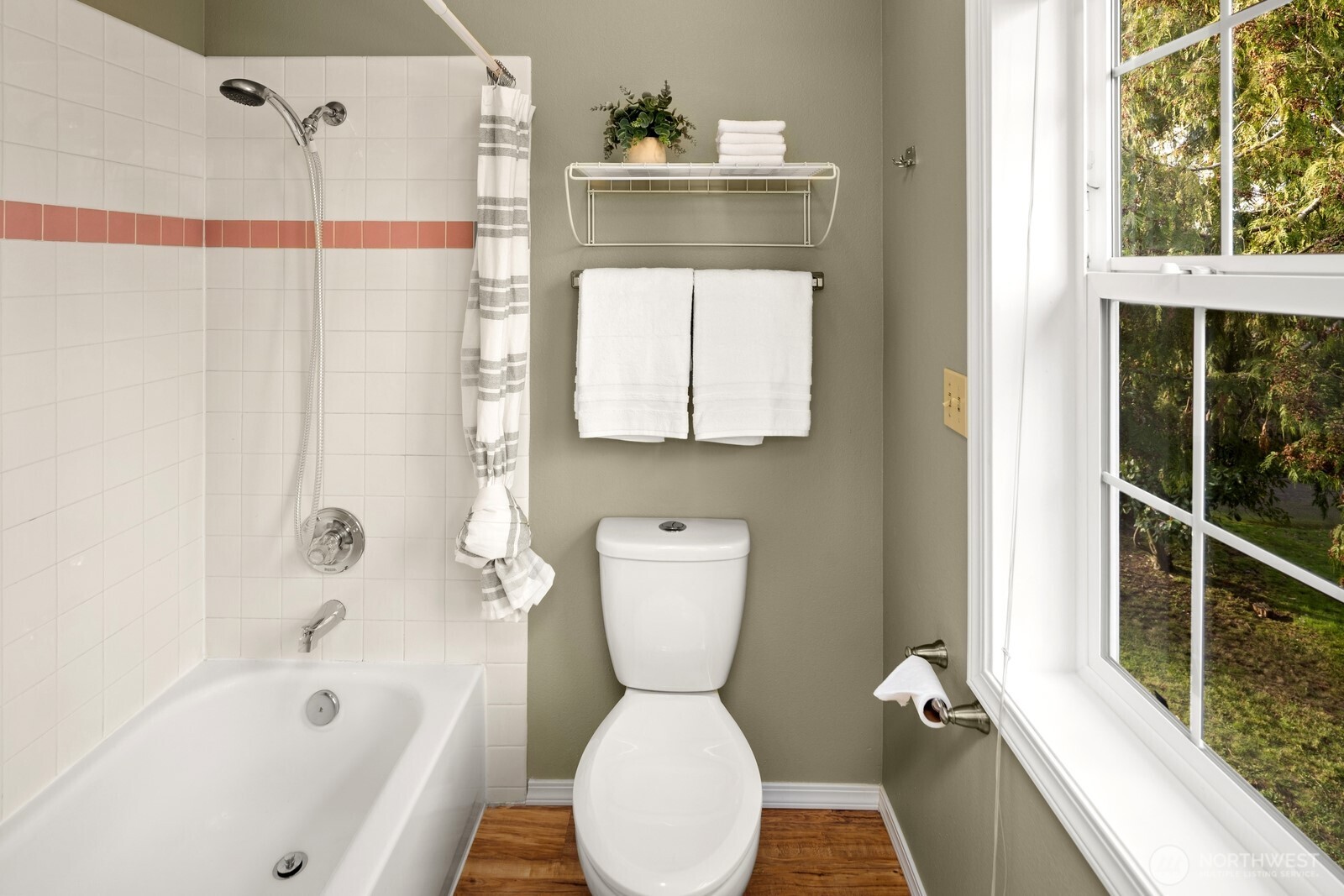 16708 5th Avenue Northeast Shoreline, WA 98155 - Photo 22 of 38 a bathroom with a sink a toilet and a bathtub