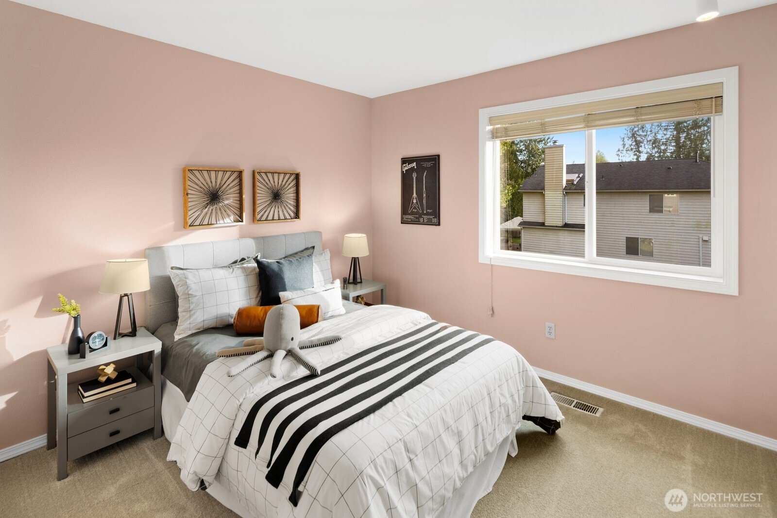 16708 5th Avenue Northeast Shoreline, WA 98155 - Photo 23 of 38 a bedroom with a bed and wooden floor