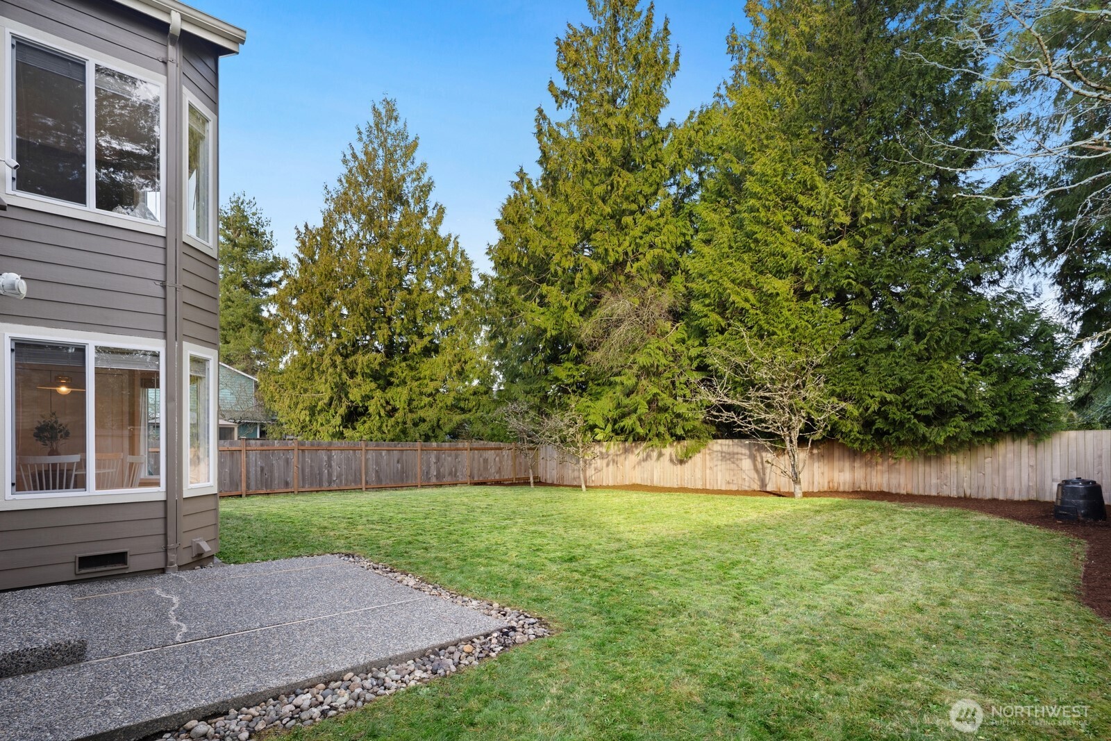 16708 5th Avenue Northeast Shoreline, WA 98155 - Photo 29 of 38 a backyard of a house with lots of green space