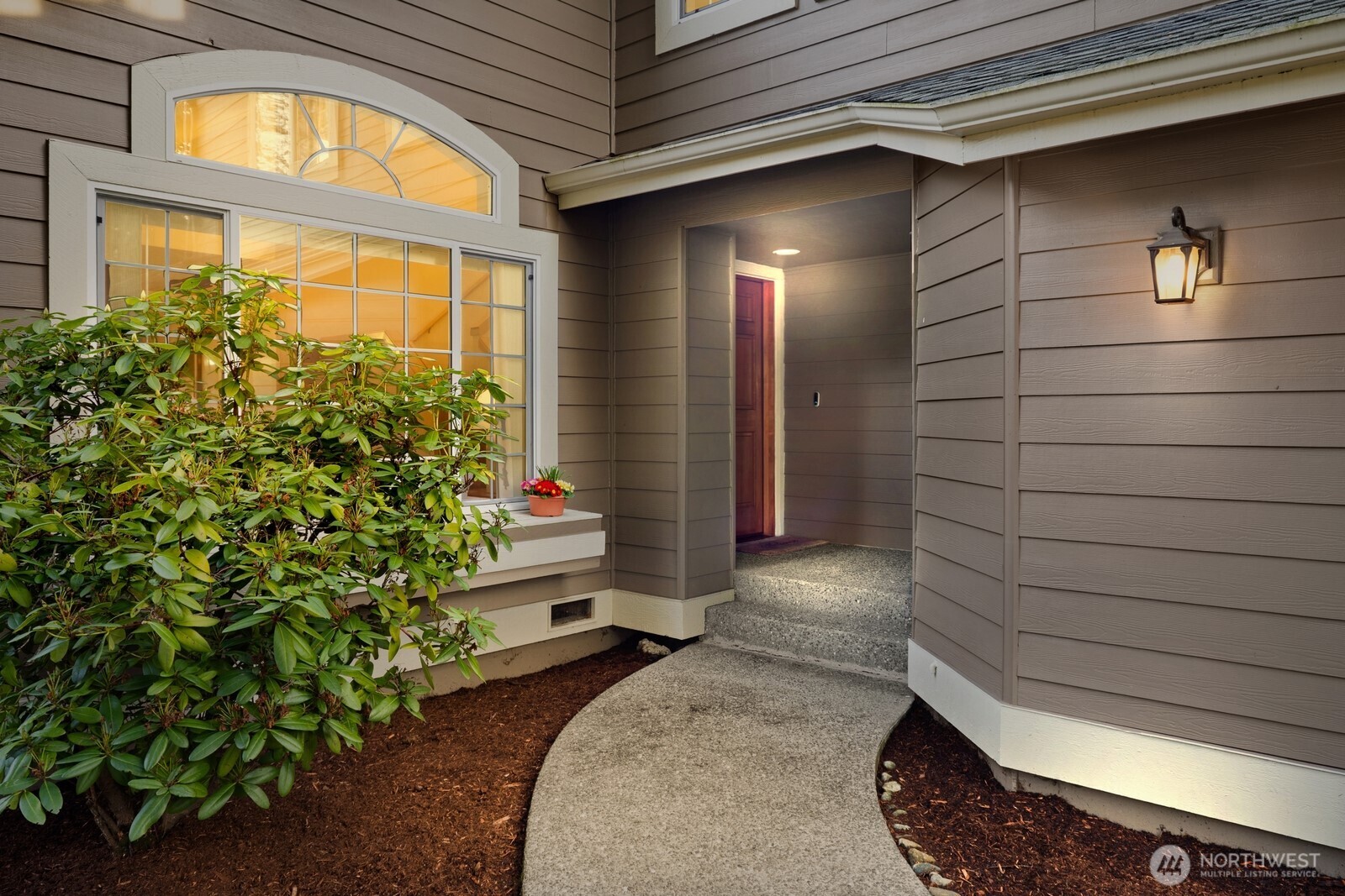 16708 5th Avenue Northeast Shoreline, WA 98155 - Photo 36 of 38 a view of a porch with a potted plant