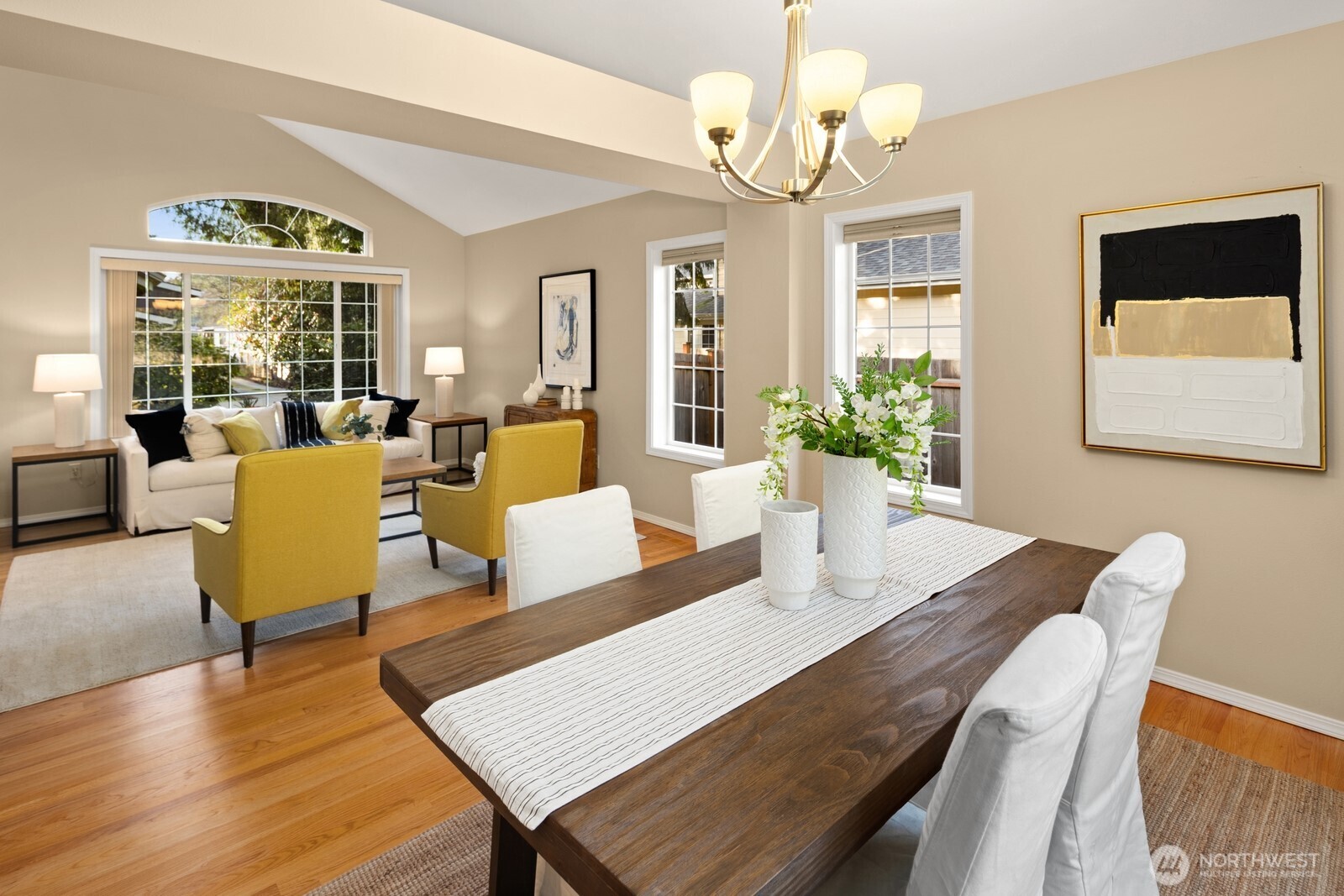 16708 5th Avenue Northeast Shoreline, WA 98155 - Photo 8 of 38 a view of a dining room with furniture wooden floor and chandelier