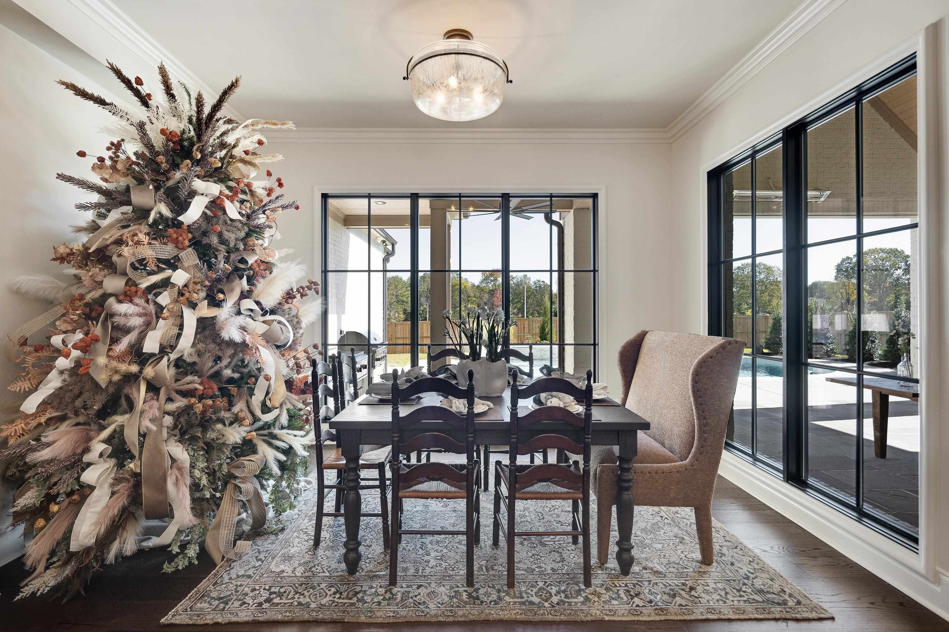 3280 Hidden Creek Loop West Collierville, TN 38017 - Photo 13 of 40 a view of a dining room with furniture window and outside view