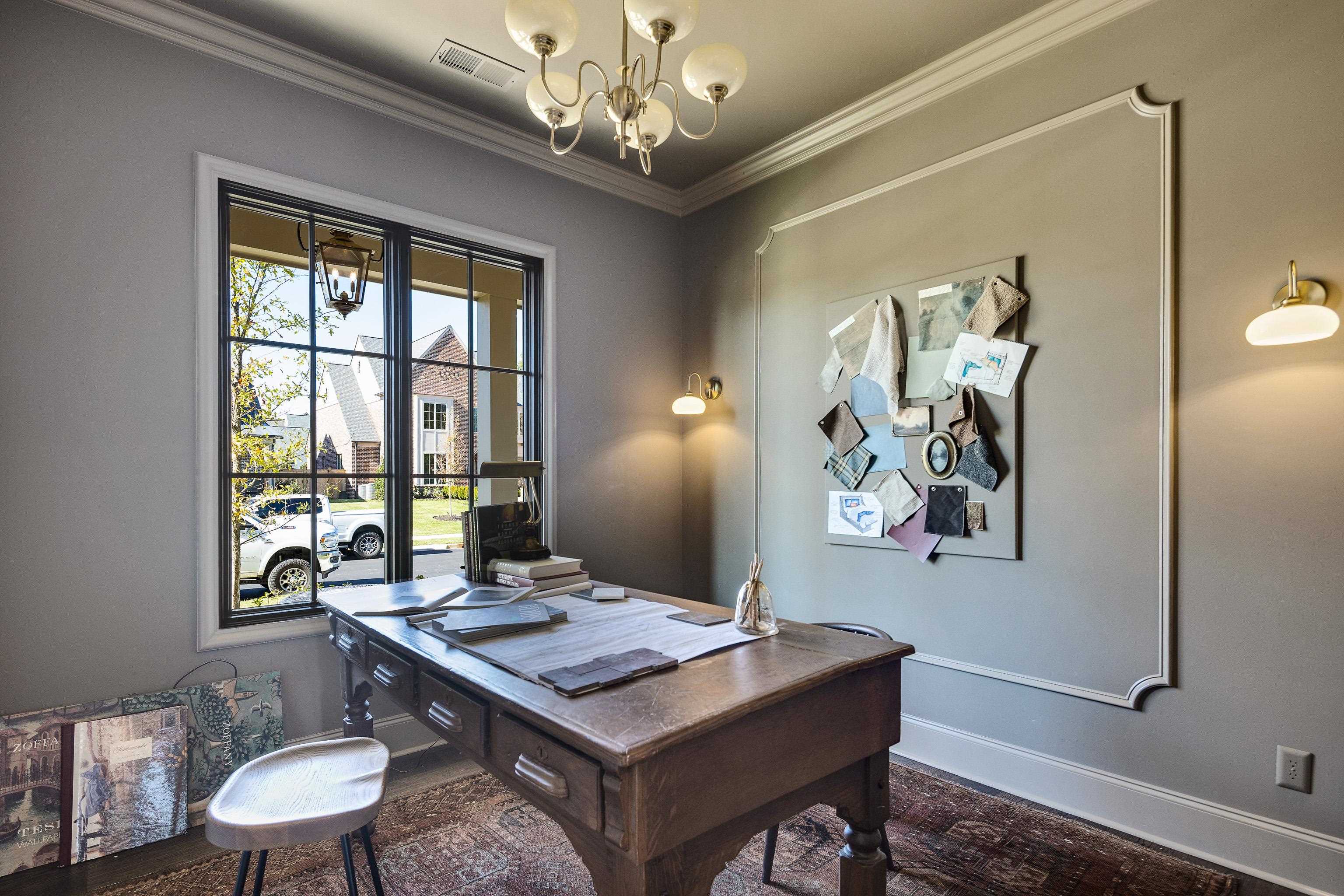3280 Hidden Creek Loop West Collierville, TN 38017 - Photo 21 of 40 a view of a dining room with furniture a chandelier and wooden floor