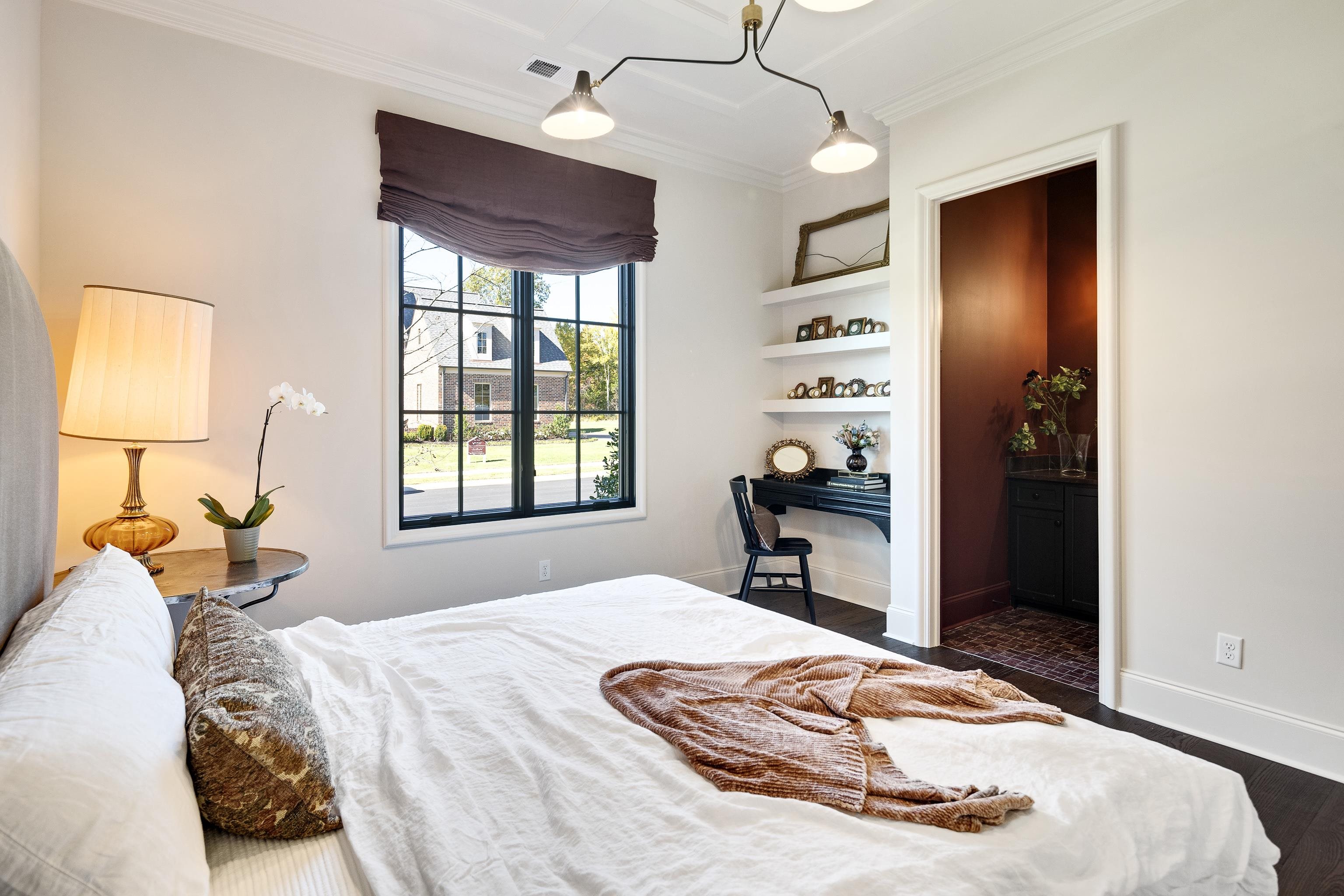 3280 Hidden Creek Loop West Collierville, TN 38017 - Photo 22 of 40 a bedroom with a bed and a large window