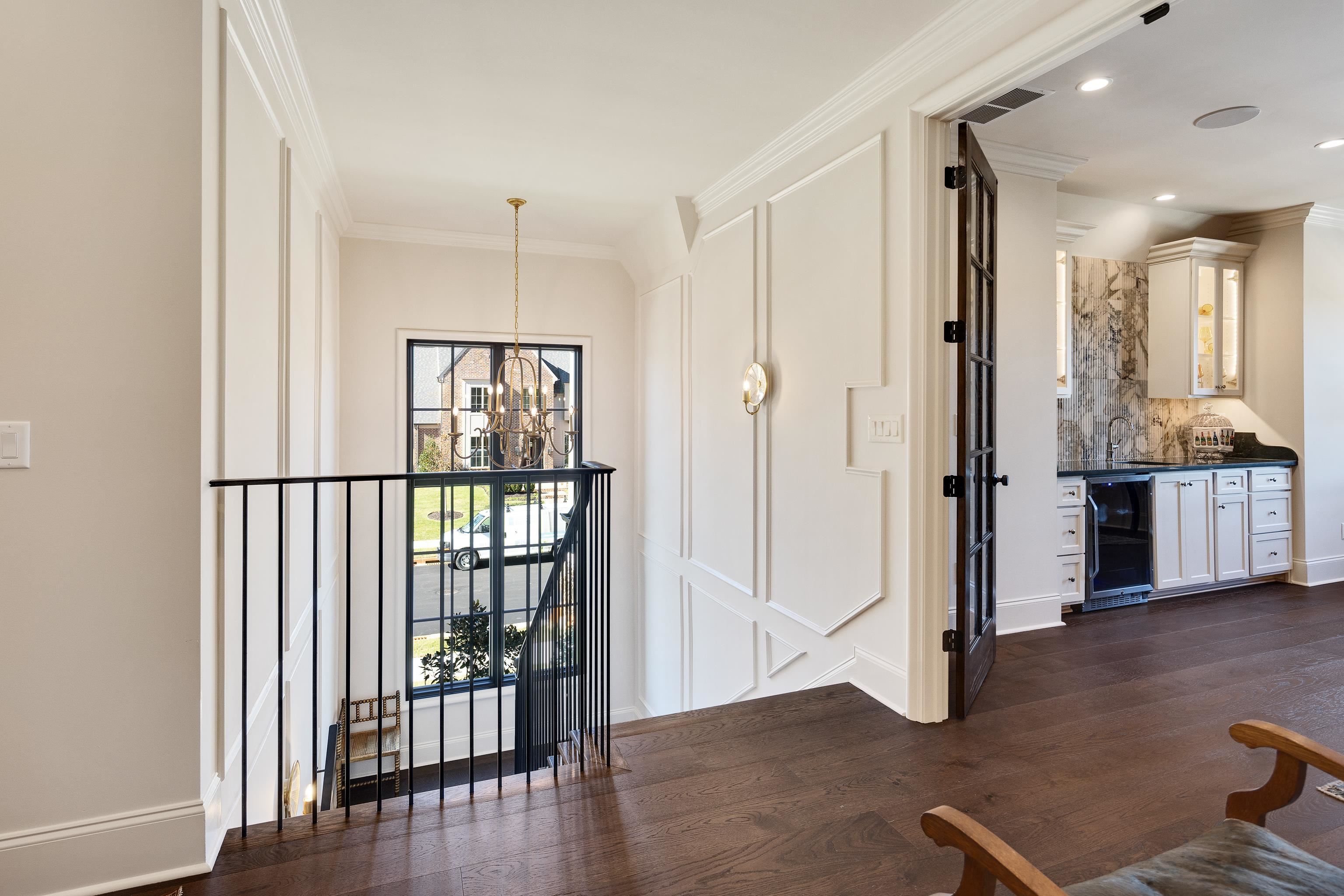 3280 Hidden Creek Loop West Collierville, TN 38017 - Photo 25 of 40 a view of a hallway with wooden floor and windows