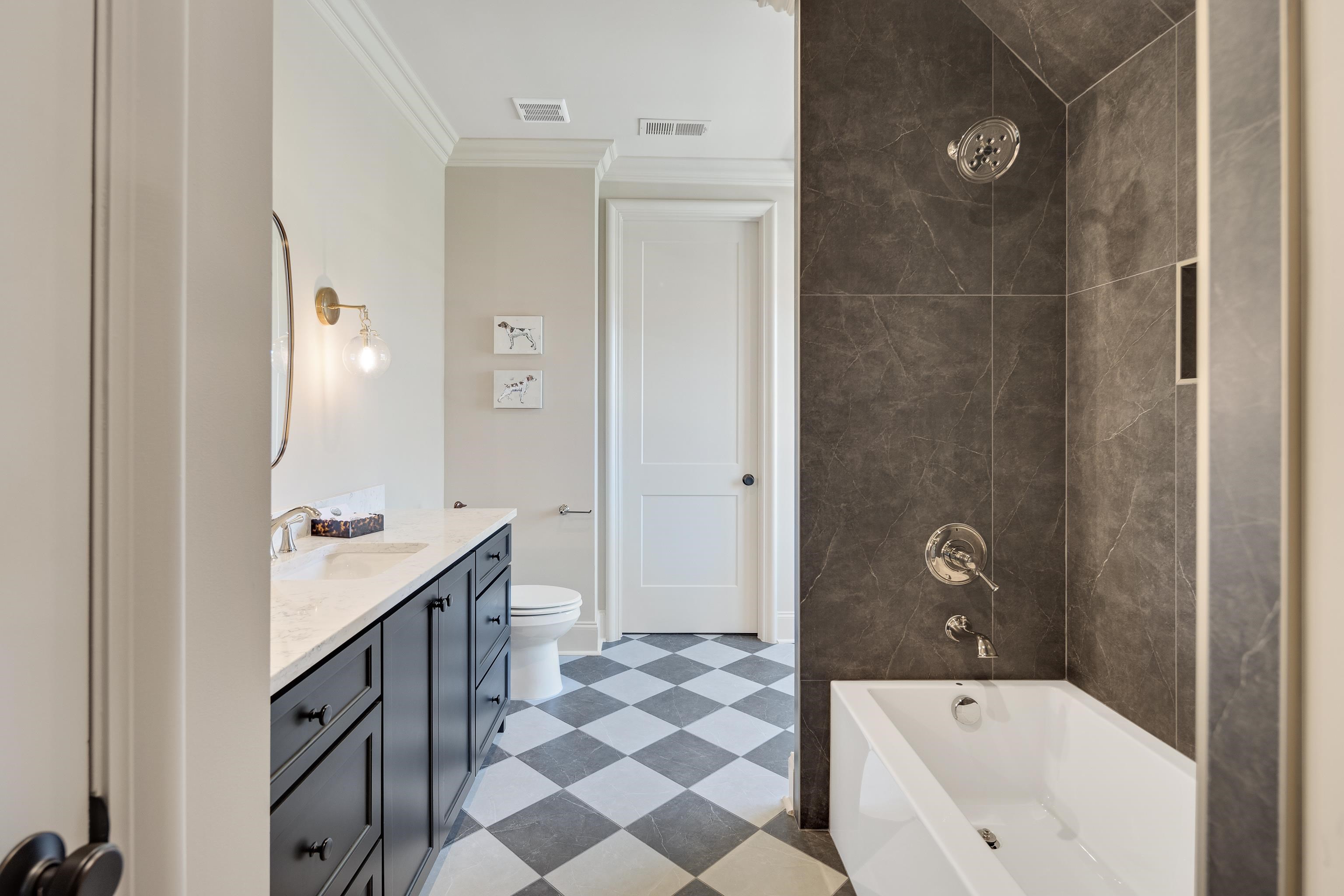 3280 Hidden Creek Loop West Collierville, TN 38017 - Photo 32 of 40 a bathroom with a sink a toilet and shower